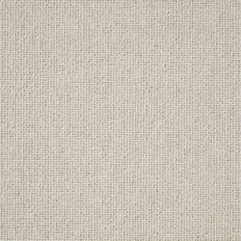 A close-up view of a beige, textured fabric with a woven pattern.