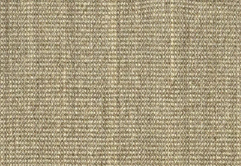 A close-up view of a textured beige fabric with a woven pattern.