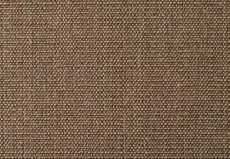 A close-up view of a woven brown fabric with a tight, uniform pattern.