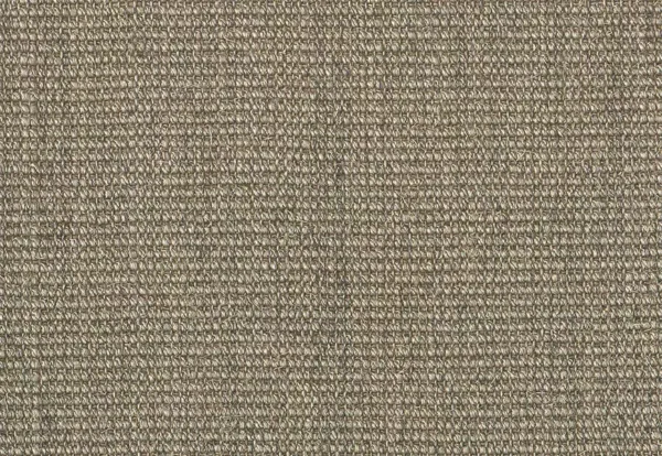 A close-up of a textured, beige fabric with a tightly woven pattern.