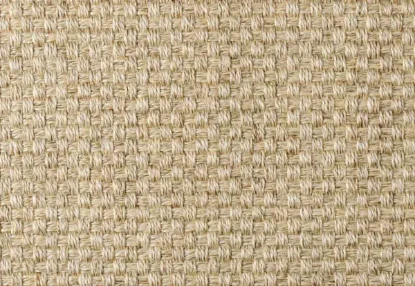 Close-up of a woven beige fabric with a textured, grid-like pattern, possibly made of natural fibers like jute or sisal.