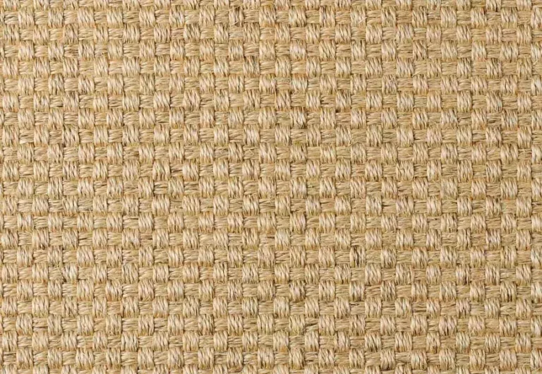 Close-up of a woven texture featuring a tight grid pattern made of natural fibers in beige tones.