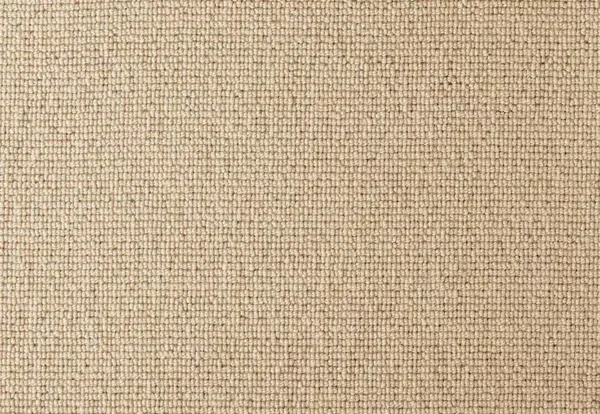 Close-up view of a beige, tightly woven fabric with a grid-like texture.