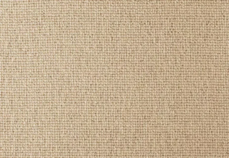 Close-up view of a beige, tightly woven fabric with a grid-like texture.