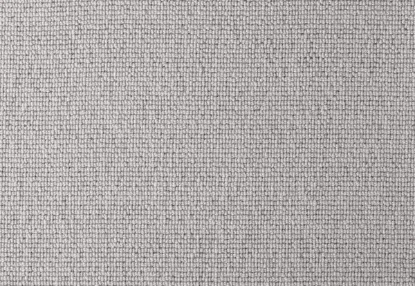 Close-up of a light grey textured woven fabric with a grid-like pattern.