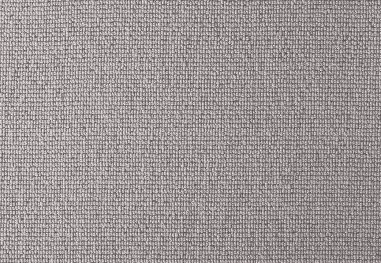 Close up of a grey carpet.