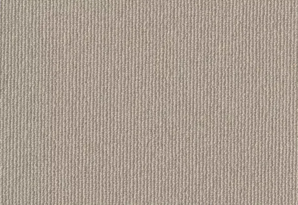 Close-up of a beige textured fabric with vertical ribbing. The material appears soft and uniform in color and texture.