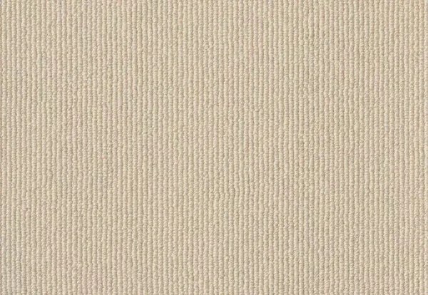 Close-up of a beige corduroy fabric showcasing its vertical ridged texture.
