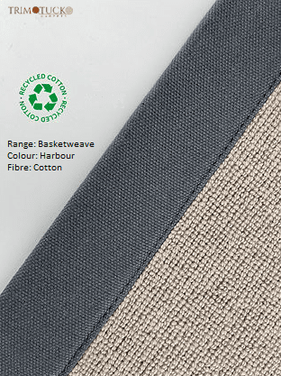 A close-up of a basketweave fabric in Harbour color with a border. The fabric is made from recycled cotton. The Trim Tuck logo and product details are displayed in the upper-left corner.