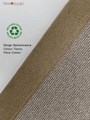 A close-up of a basketweave fabric sample with a tawny color from the TrimTuck label. Made of recycled cotton. Text provides details on the range, color, and fiber.