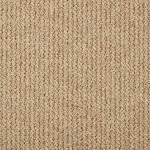 Close-up view of beige textured carpet with vertical ribbing pattern.