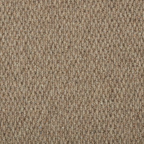 Close-up image of a beige, textured carpet with a loop pile construction.