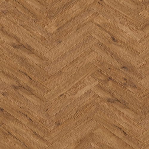 A herringbone pattern wood floor with various shades of brown.
