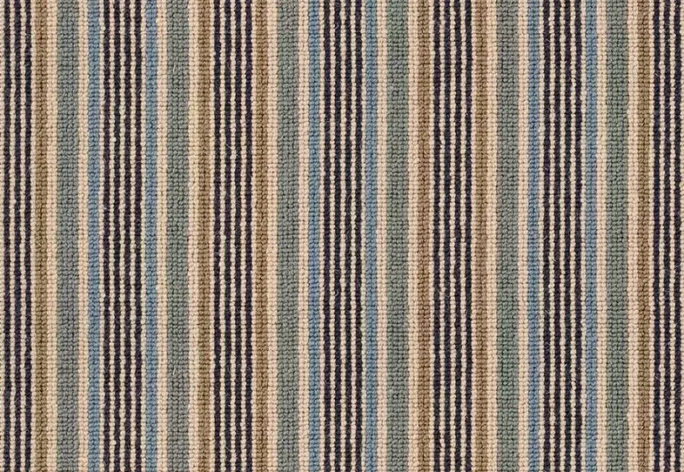 A close-up view of a textured fabric with vertical stripes in beige, blue, and dark brown colors.