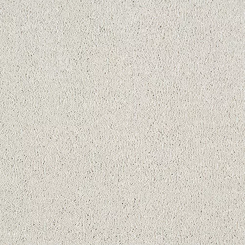 Close-up of a plain grey textured surface.