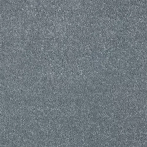Close-up view of a textured gray carpet.