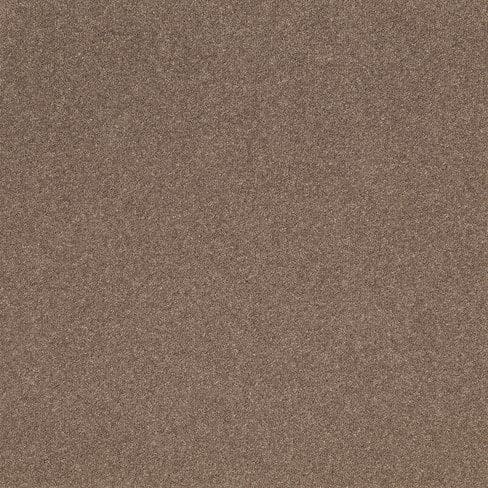 A close-up view of a textured brown surface, possibly sandpaper.