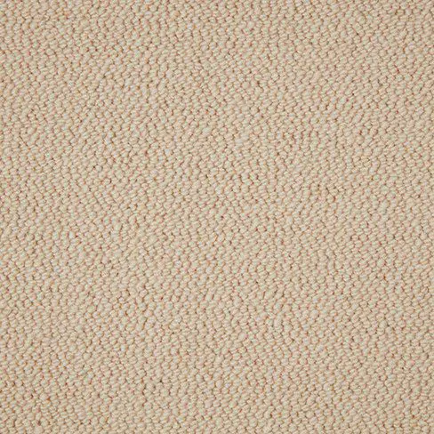 Close-up view of a beige textured fabric with a woven pattern.