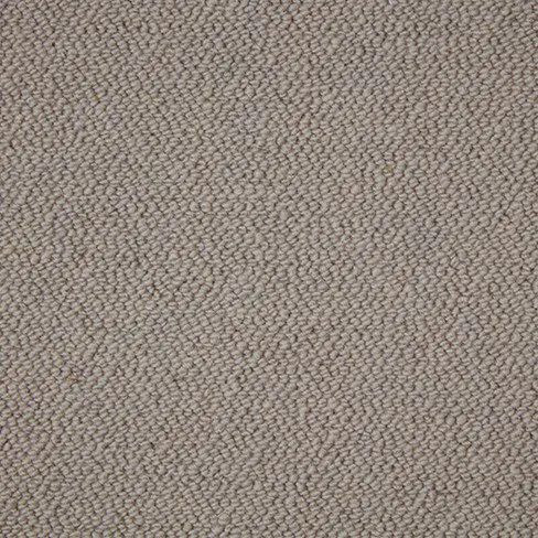 Close-up of a grey textured fabric with a woven pattern.