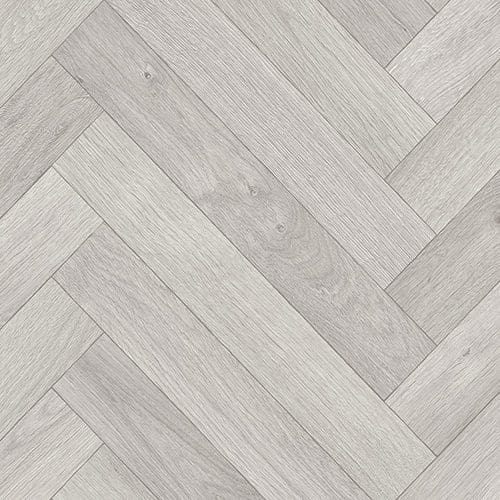 Light gray herringbone patterned wood flooring with a smooth texture and subtle wood grain.