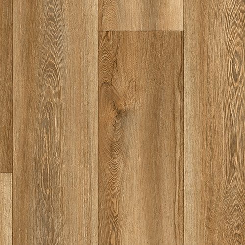 A close-up view of wooden flooring with a natural oak pattern, showcasing various shades and grain textures.