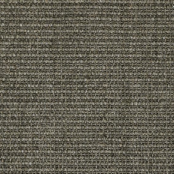 Close-up image of gray, textured fabric with a woven pattern.