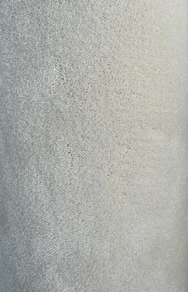 A close-up of Westex Silken Velvet with a slight sheen. The texture appears to be soft and slightly uneven.