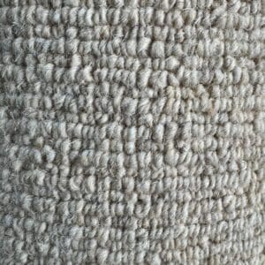 Close-up view of a Wool Loop Remnant with a looped texture in a light grey color.