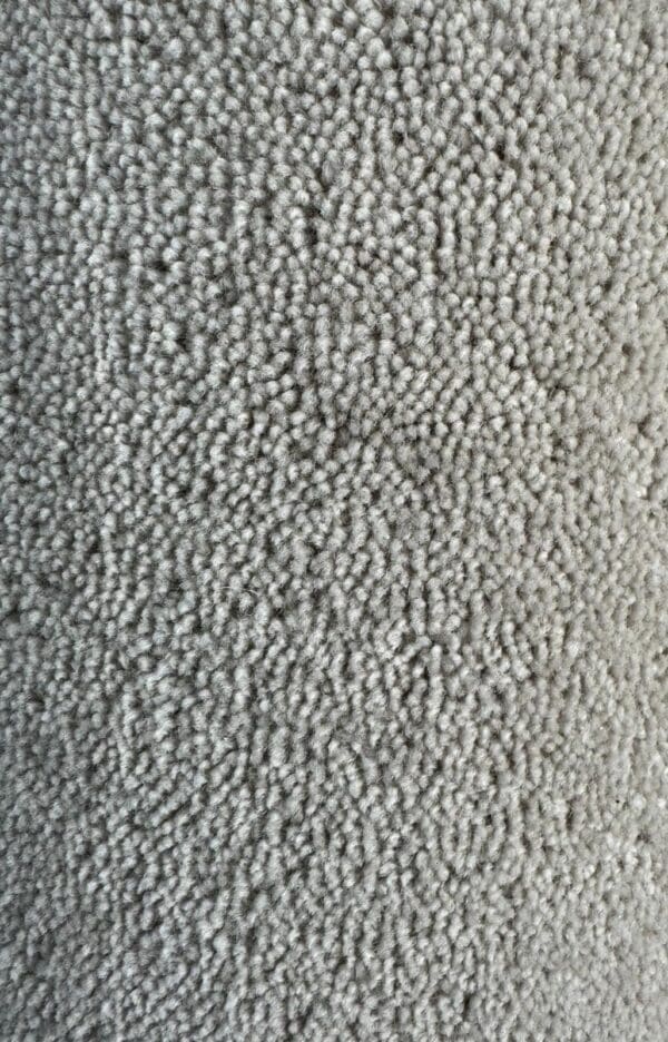 Close-up image of a textured grey Wool Twist Remnant with a plush, thick pile.