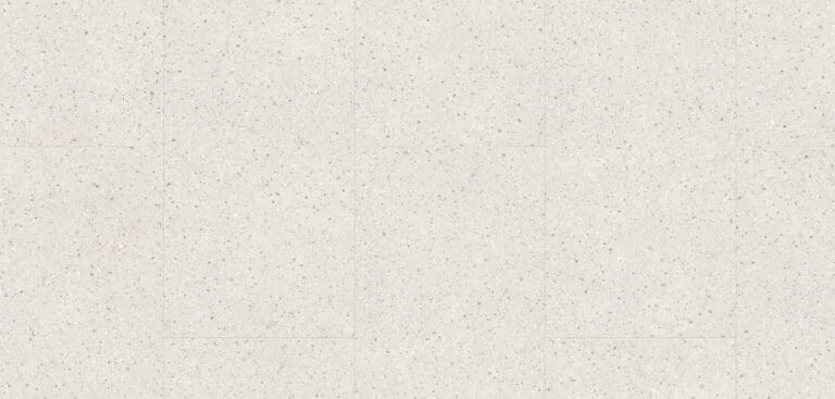 Light beige speckled marble texture surface.
