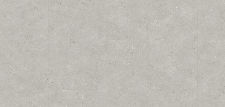 Gray textured concrete wall with subtle speckles.