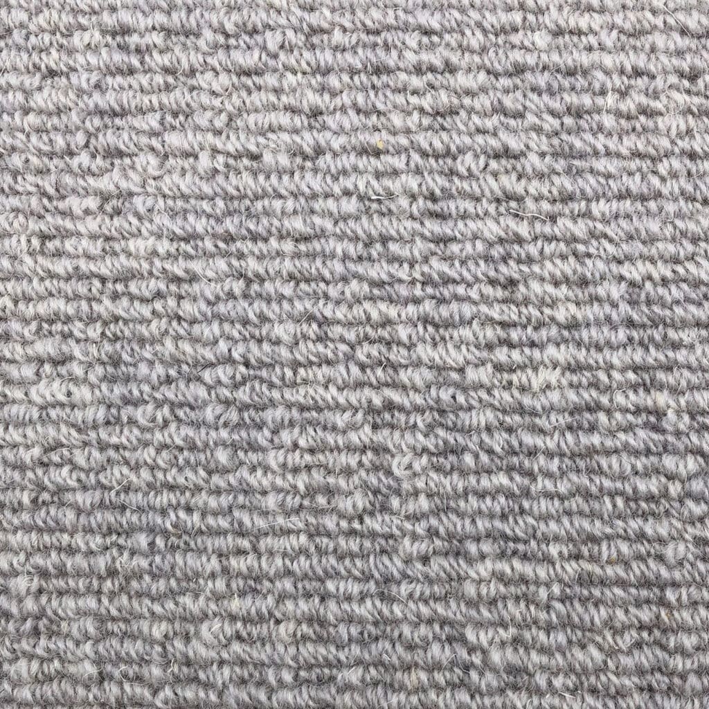 Gray textured carpet close-up view.