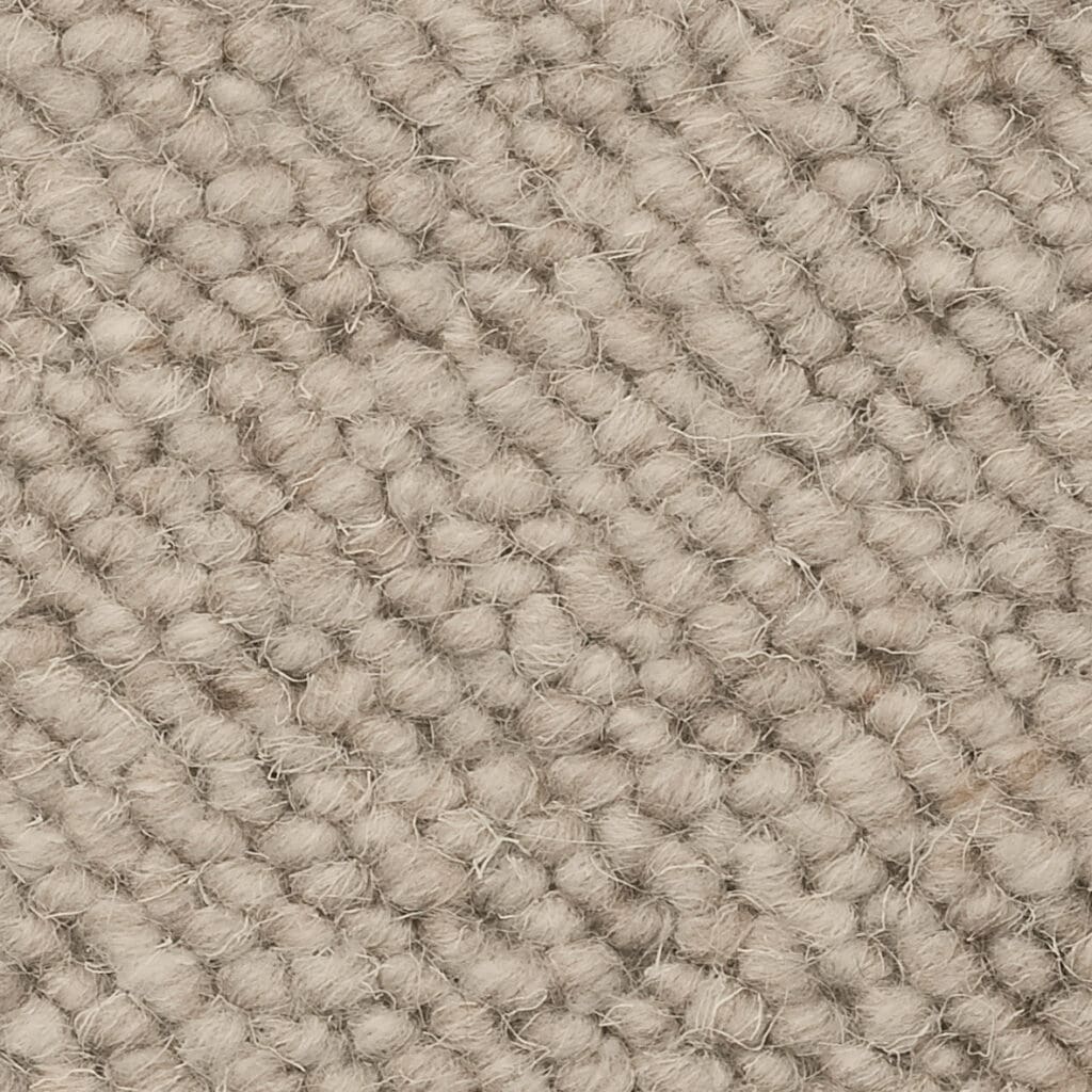 Close-up of beige woven textile texture.