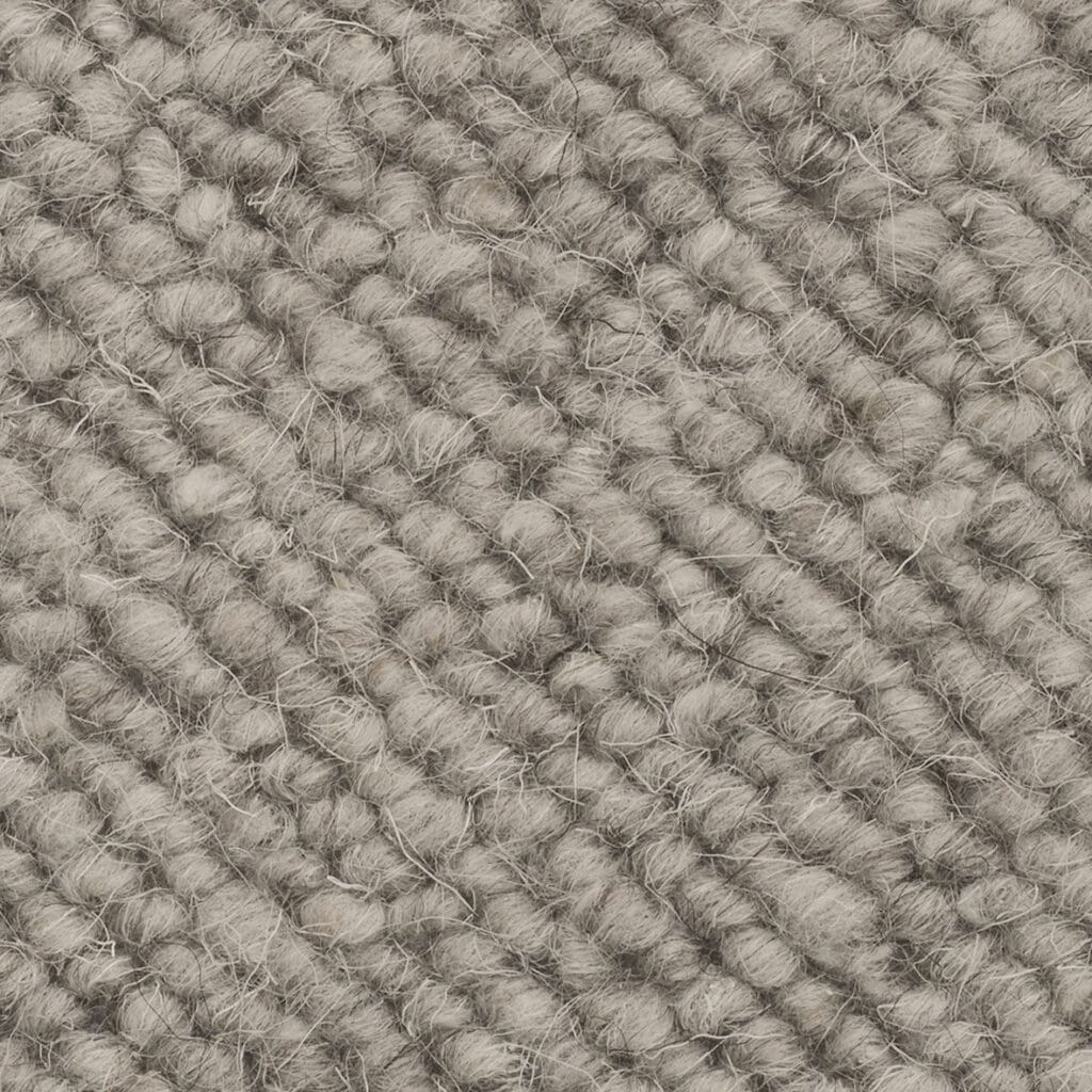 Gray textured woven fabric close-up.