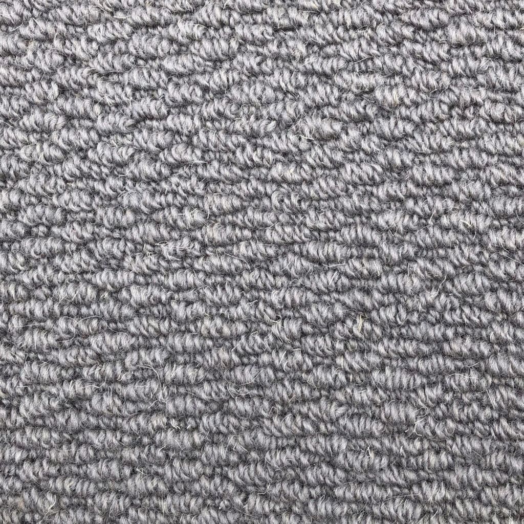 Gray textured carpet close-up view.