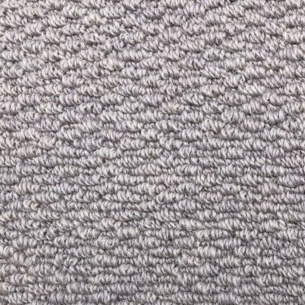 Gray textured carpet with looped pattern.