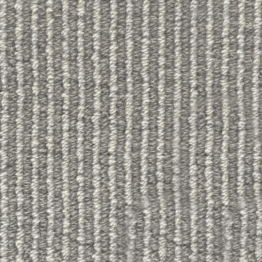 Gray textured fabric with vertical stripes.