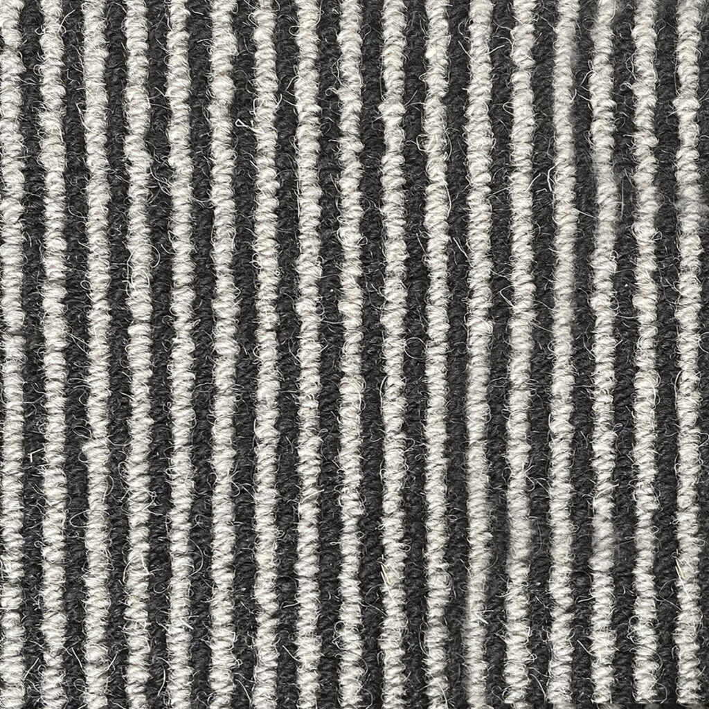 Gray and white striped textured fabric close-up.