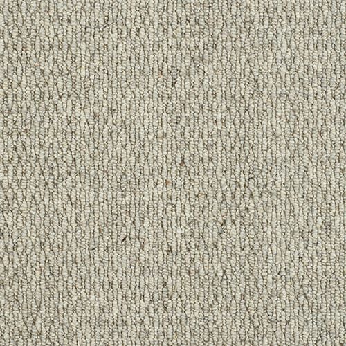 Beige textured carpet close-up pattern.