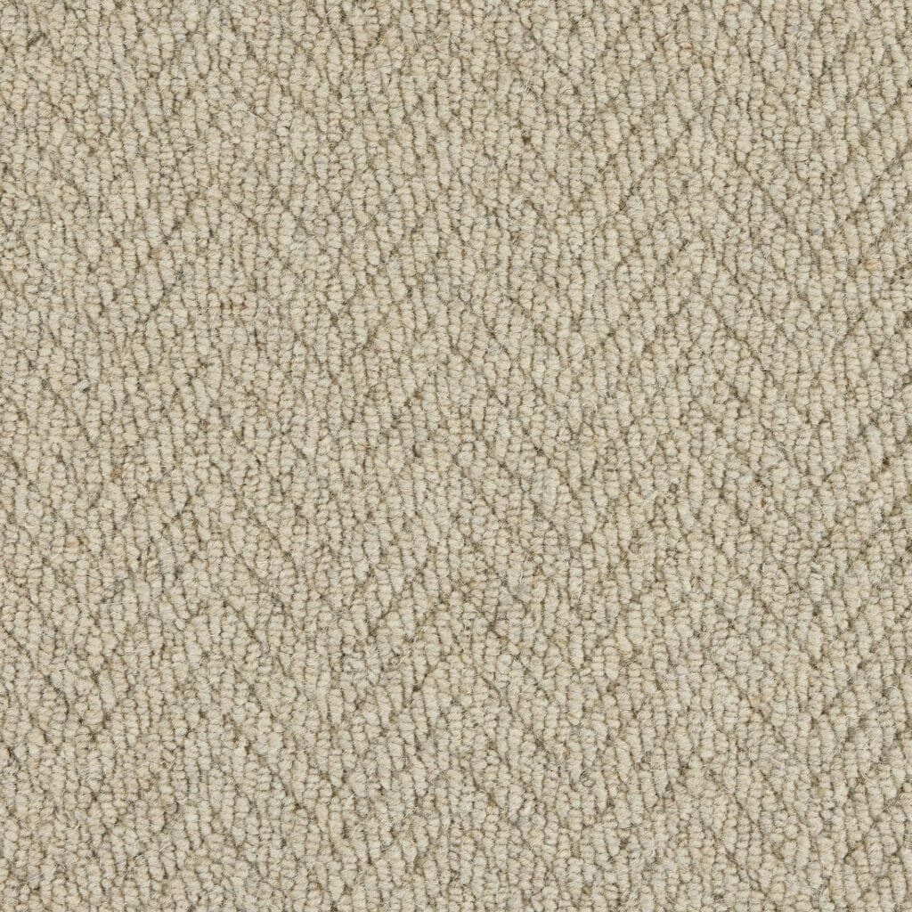 Beige herringbone patterned carpet texture.