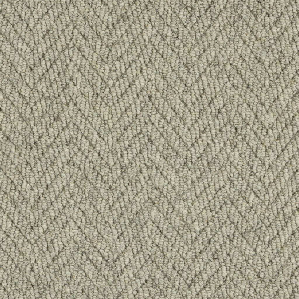 Gray herringbone carpet texture.