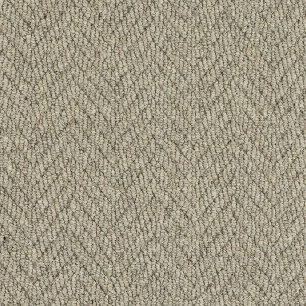 Beige herringbone textured fabric pattern.