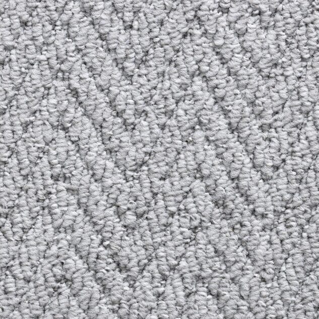 Gray textured herringbone pattern carpet close-up.