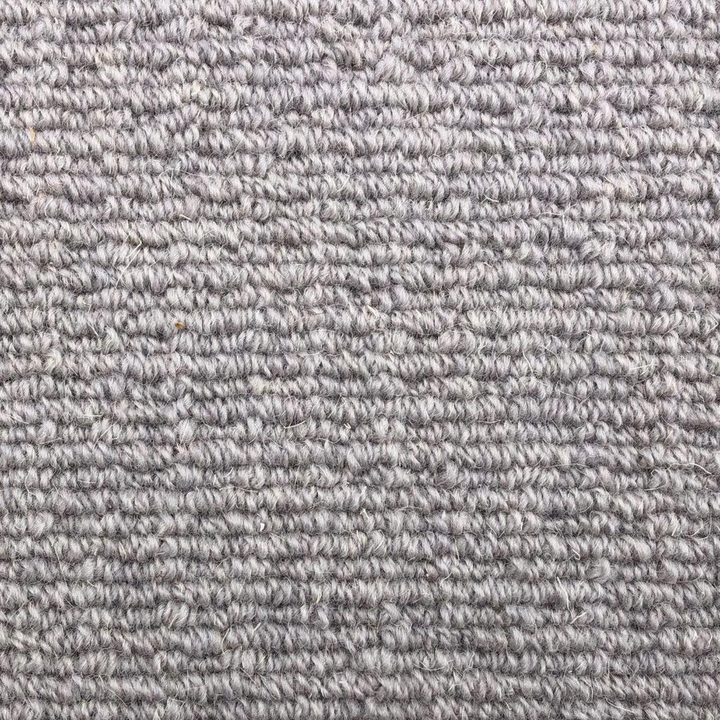 Gray textured fabric with horizontal patterns.