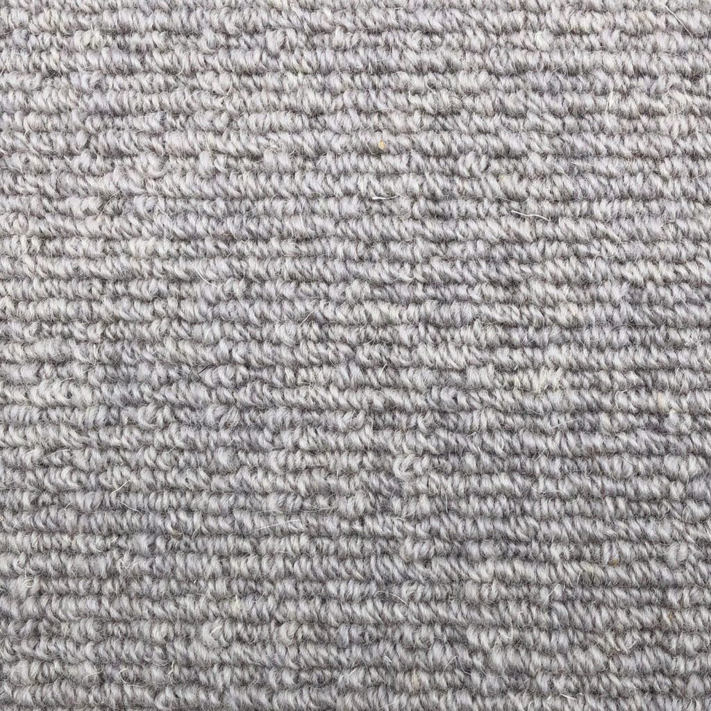 Gray textured carpet close-up view.