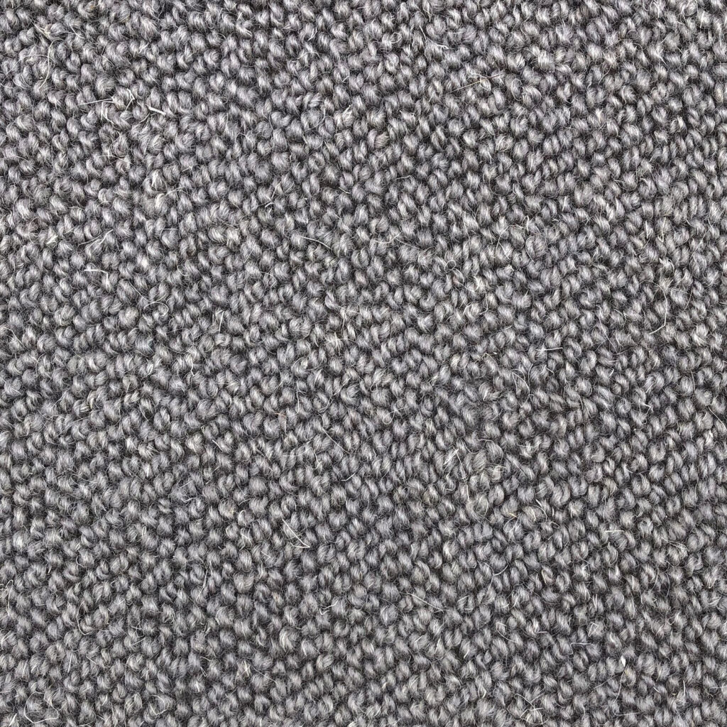 Gray textured knitted fabric close-up.