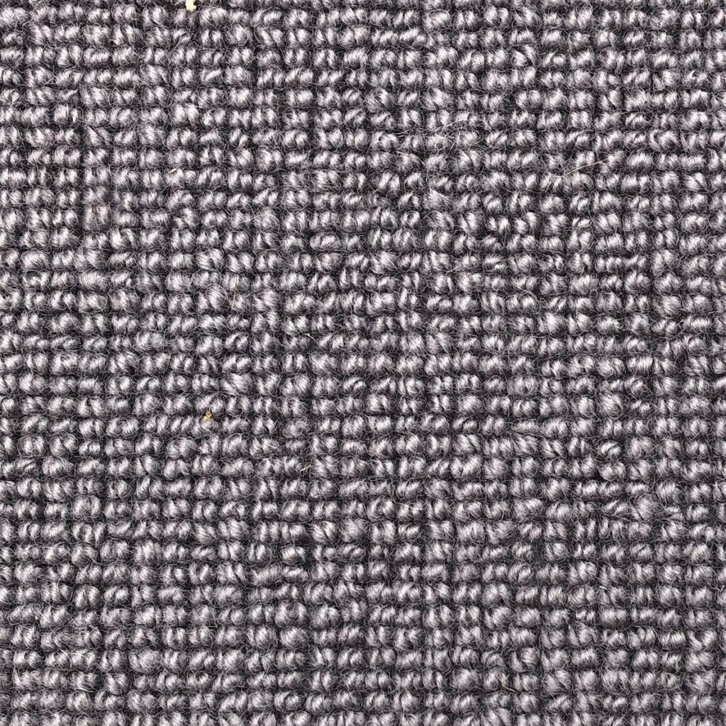 Gray textured woven fabric close-up.