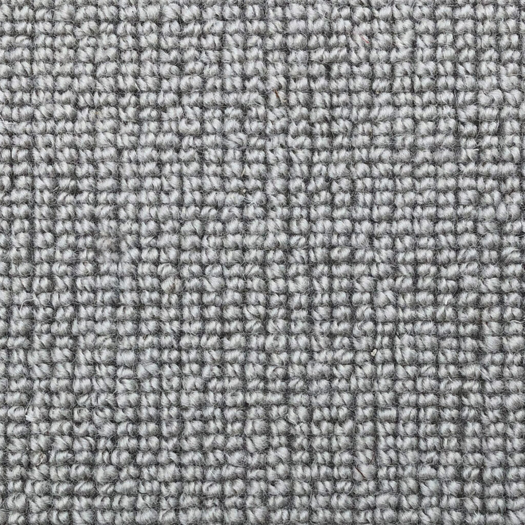 Gray textured woven fabric close-up.