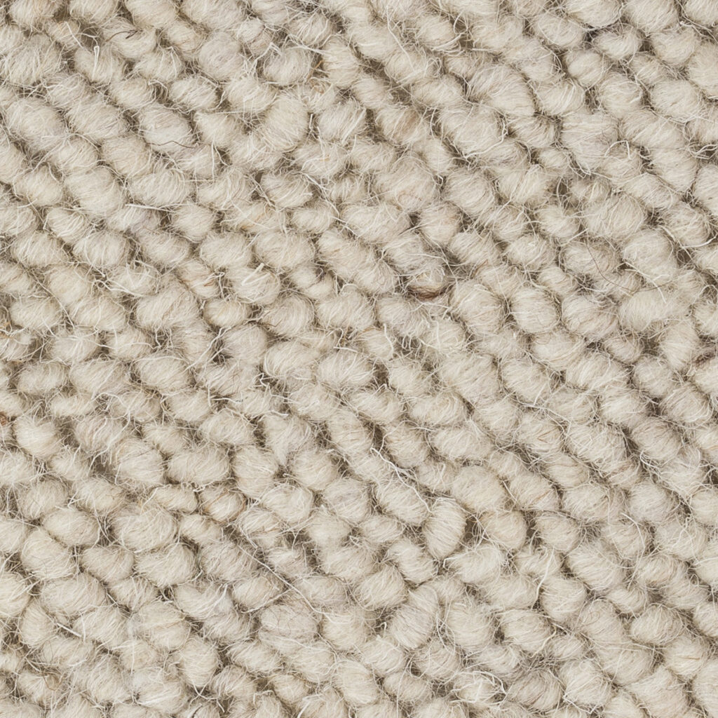 Close-up of beige woven fabric texture.