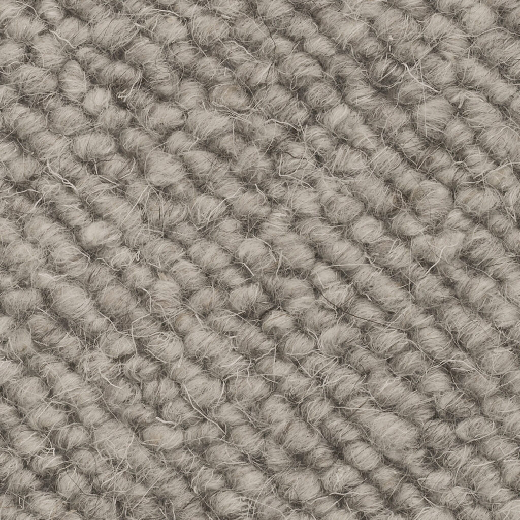 Gray textured woven fabric close-up.